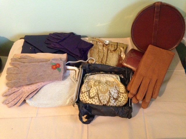 Selection of vintage handbags, gloves etc.