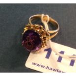 A 9ct gold and amethyst dress ring size O