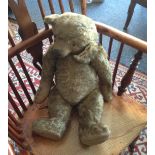 Vintage straw filled teddy in need of a loving home