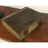 Brown's Self Interpreting bible with embossed covers in need of TLC