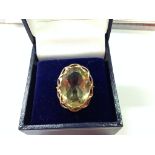 A 9ct gold and citrine dress ring size O