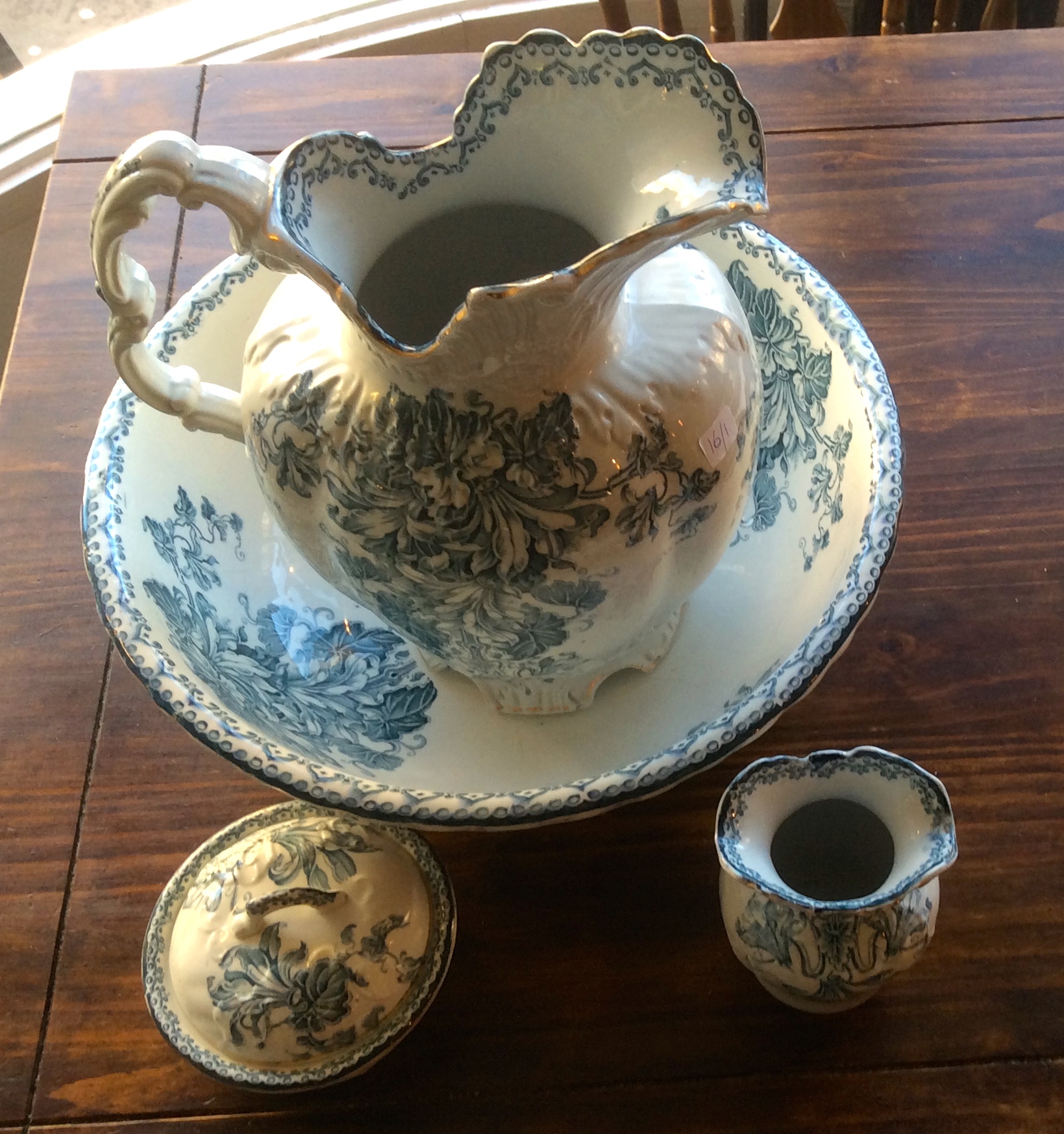 A 19thc wash bowl, jug, soap dish, and tooth holder
