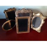 Five modern silver photo frames