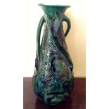 A large C H Brannan pottery vase by James Dewdney dated 1903