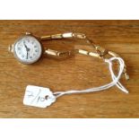 Ladies wrist watch with 14ct gold strap