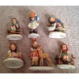 Six various Hummel figures