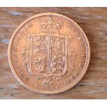 Half sovereign 1884 young Victoria's head