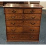 A 19th c 5 height oak chest of drawers lacking feet