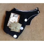 A 1920's bathing costume, child's kid gloves and a box pearl buttons