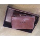 Leather suitcase, butlers tray with no stand and an oval mirror