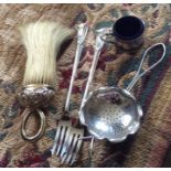 Five items silverware inc. chinese tea strainer, brush etc.