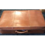 Leather suitcase.