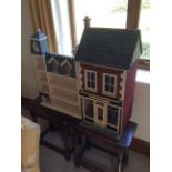 And Albert dolls house with extention and contents