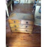 A 1920's miniature oak chest of drawers