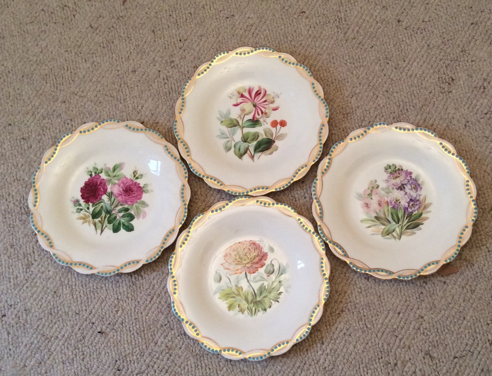 Four 19th c porcelain botanical plates