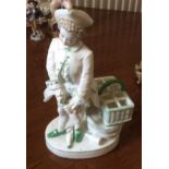 Good quality continental porcelain figure of a toper opening another bottle.