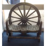 Unusual garden seat with cart wheel back