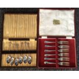 Boxed silver cake forks and six silver teaspoons, approximate weight 5.2ozs.