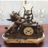 Good French gilt metal mantle clock with silk suspension