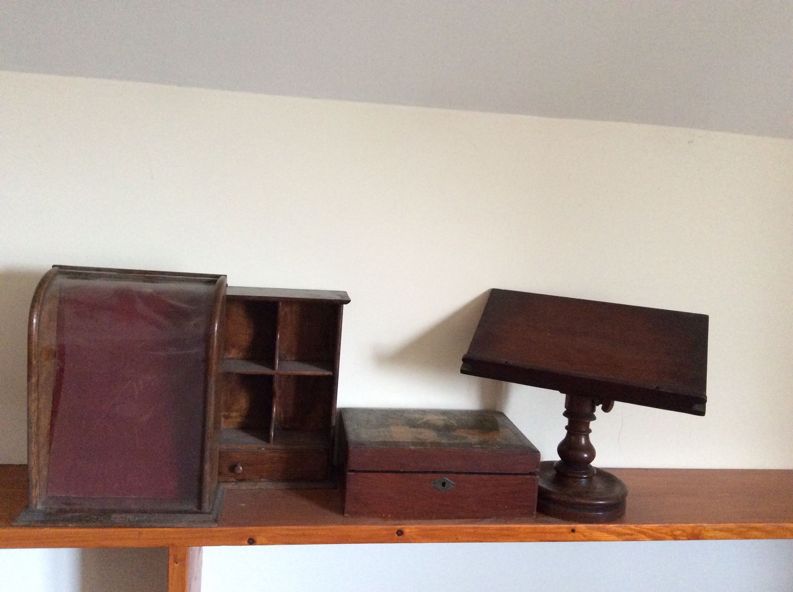 A writing box, display case, lecturn and a miniature dresser