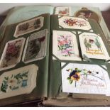 Vintage postcard album inc. embroidered and a sample book from