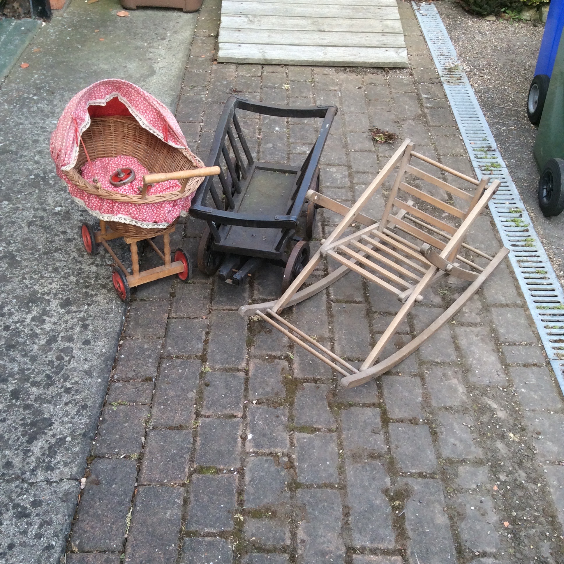 Wicker work toy pram, a rocking chair etc.