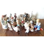 A collection of figurines inc. Capodimonte etc.