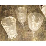 Three engraved glass celery vases.