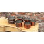 Set of six various copper pans