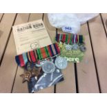 Set of WW II service medals inc. Burma Star, 39-45 Star a ration book together with Dress Set