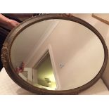 Oval bevelled glass wall mirror 32" x 23"