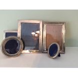 Five various silver photo frames
