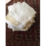 Large quantity of embroidered and crochetwork table cloths