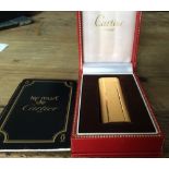 Gold plated Cartier gas cigarette lighter in original box with paperwork