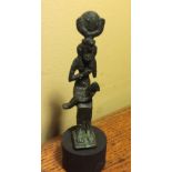 Bronze figure of Isis wearing crown with solar disc suckling Horus 9.3 cm high