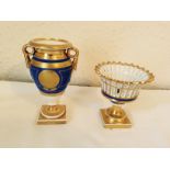 Two fine quality blue, white and gilt miniature vases