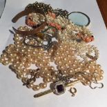 An assortment of costume jewelleryinc. Silver chain etc.