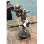 An 18th c bronze putti