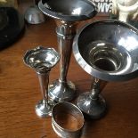 Four pieces silver three vases and a napkin ring