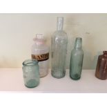 Four items glassware inc. Chemist jar "CALAMINA", a moulded bottle, Beverly(sic) Water bottle and