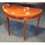 An 18thc mahogany  demi-lune tea table slight crack to top