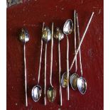 Set of nine Oriental white metal straw/spoons with bamboo decoration