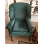 Good quality 19th c wing armchair with mahogany feet and double casters