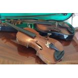 Two violins, a case, two bows and another violin a/f
