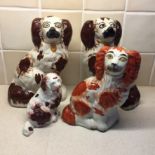 Four various 19th c Staffordshire dogs