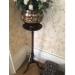 Reproduction mahogany torchere  and a brass jardiniere