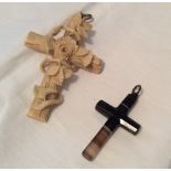 Finely carved ivory cross and an agate cross
