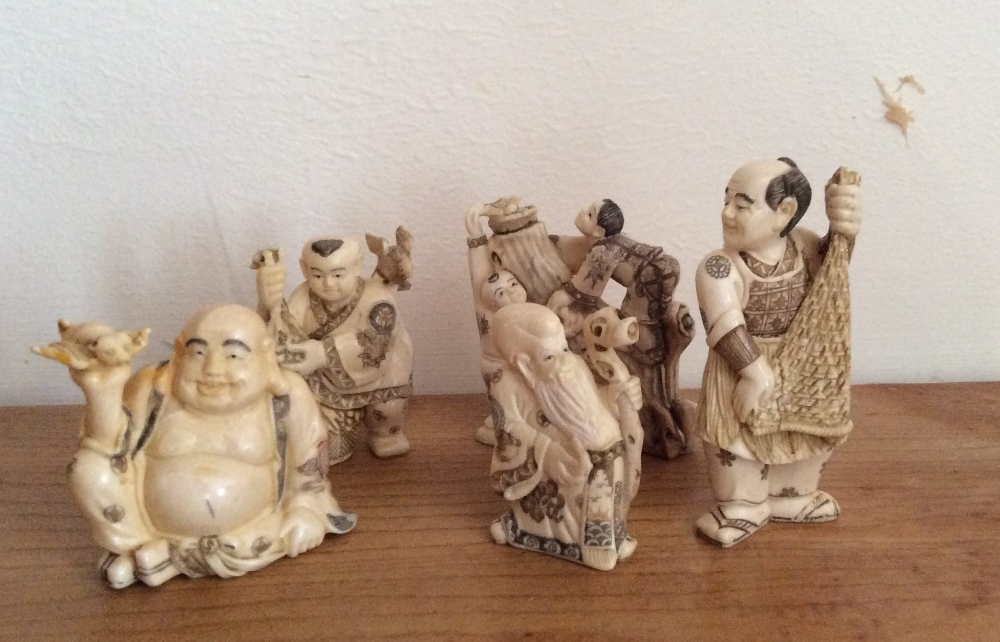 Five Japanese ivory netsuke inc. a buddha