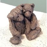 Sterling silver cased model of two bears