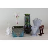 An Art Deco frosted glass vase, another smaller, a floral decorated glass vase in enamels, an